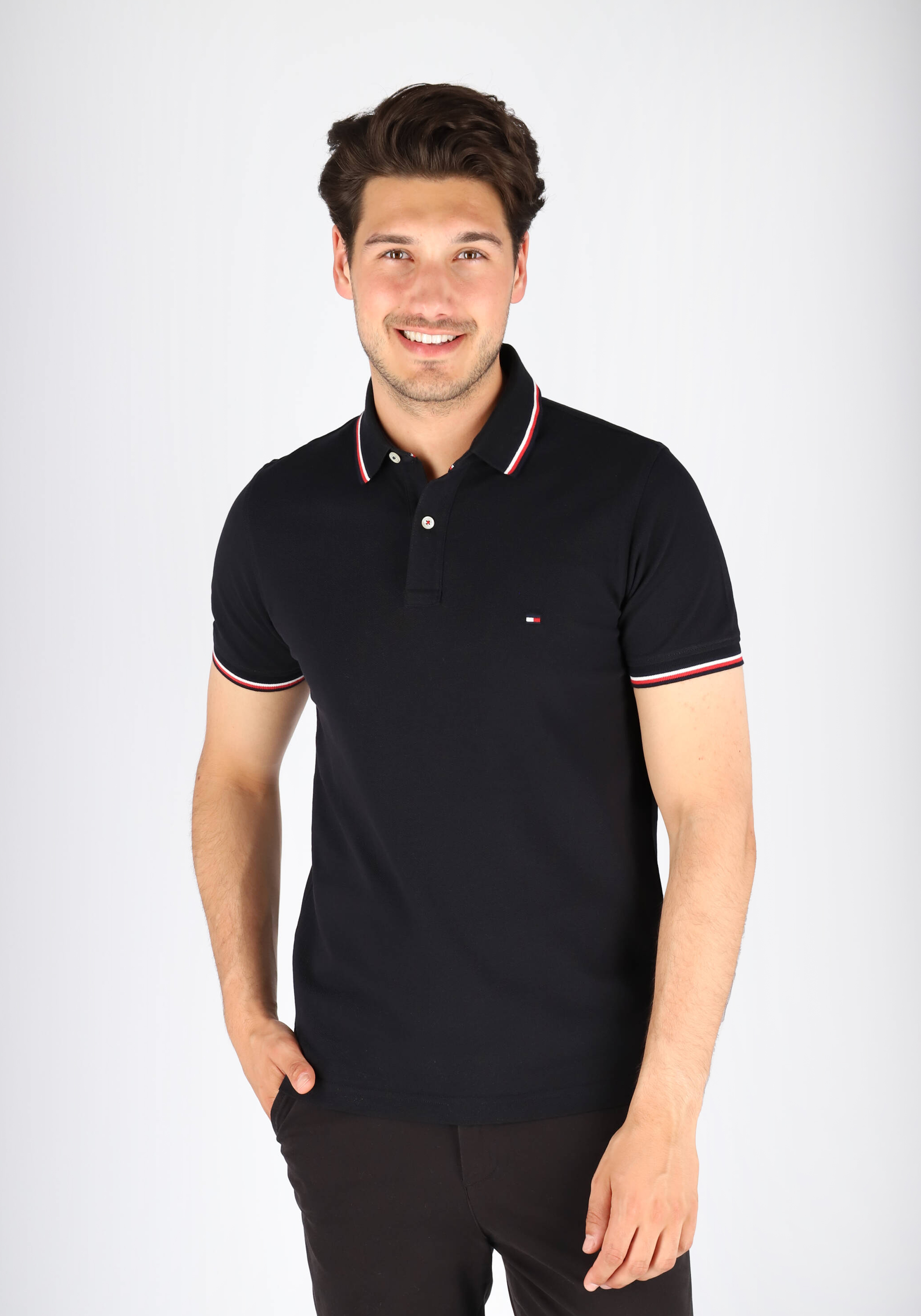 Tommy Hilfiger Core slim fit polo, heren polo met contrastbiezen, zwart