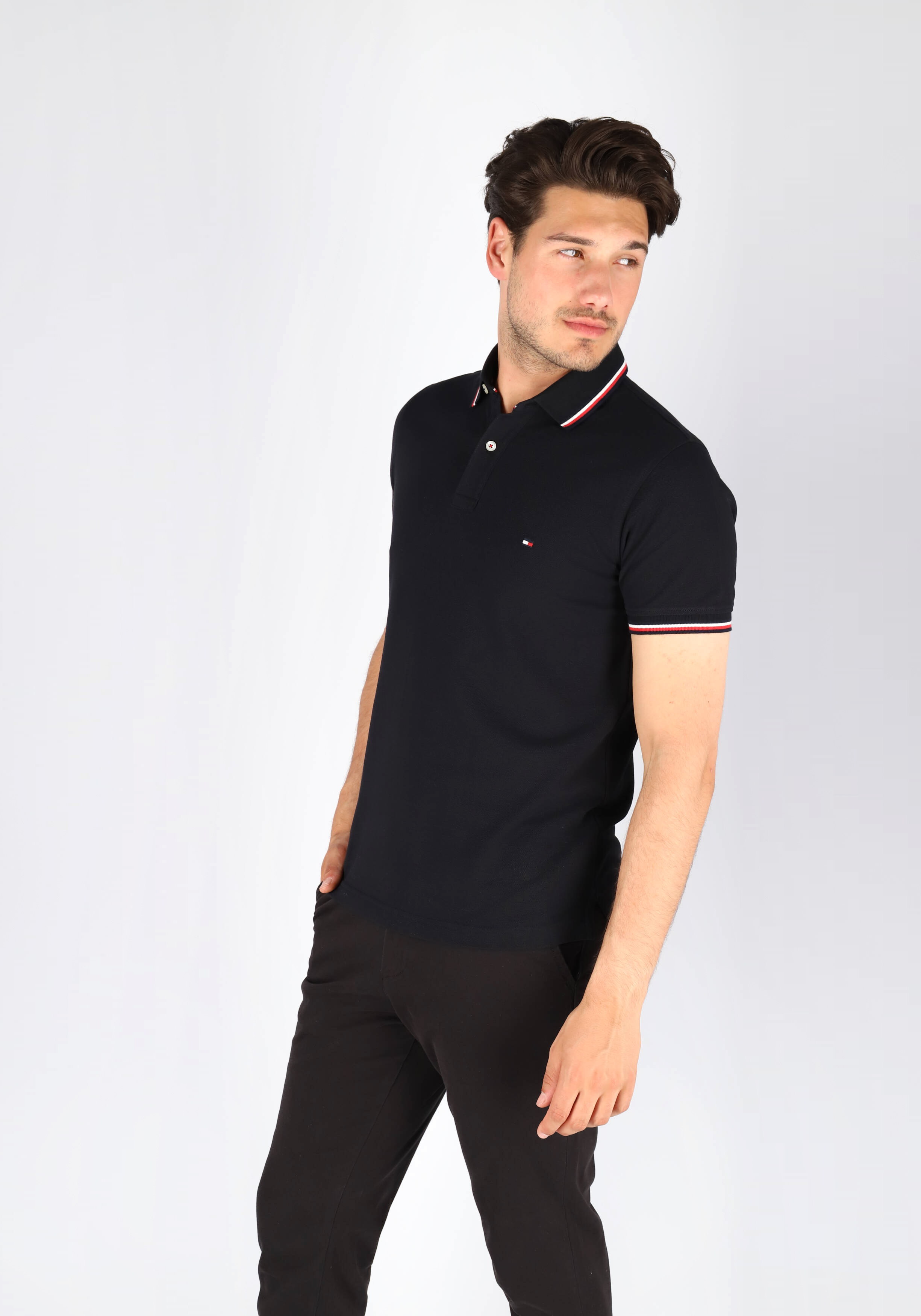 Tommy Hilfiger Core slim fit polo, heren polo met contrastbiezen, zwart