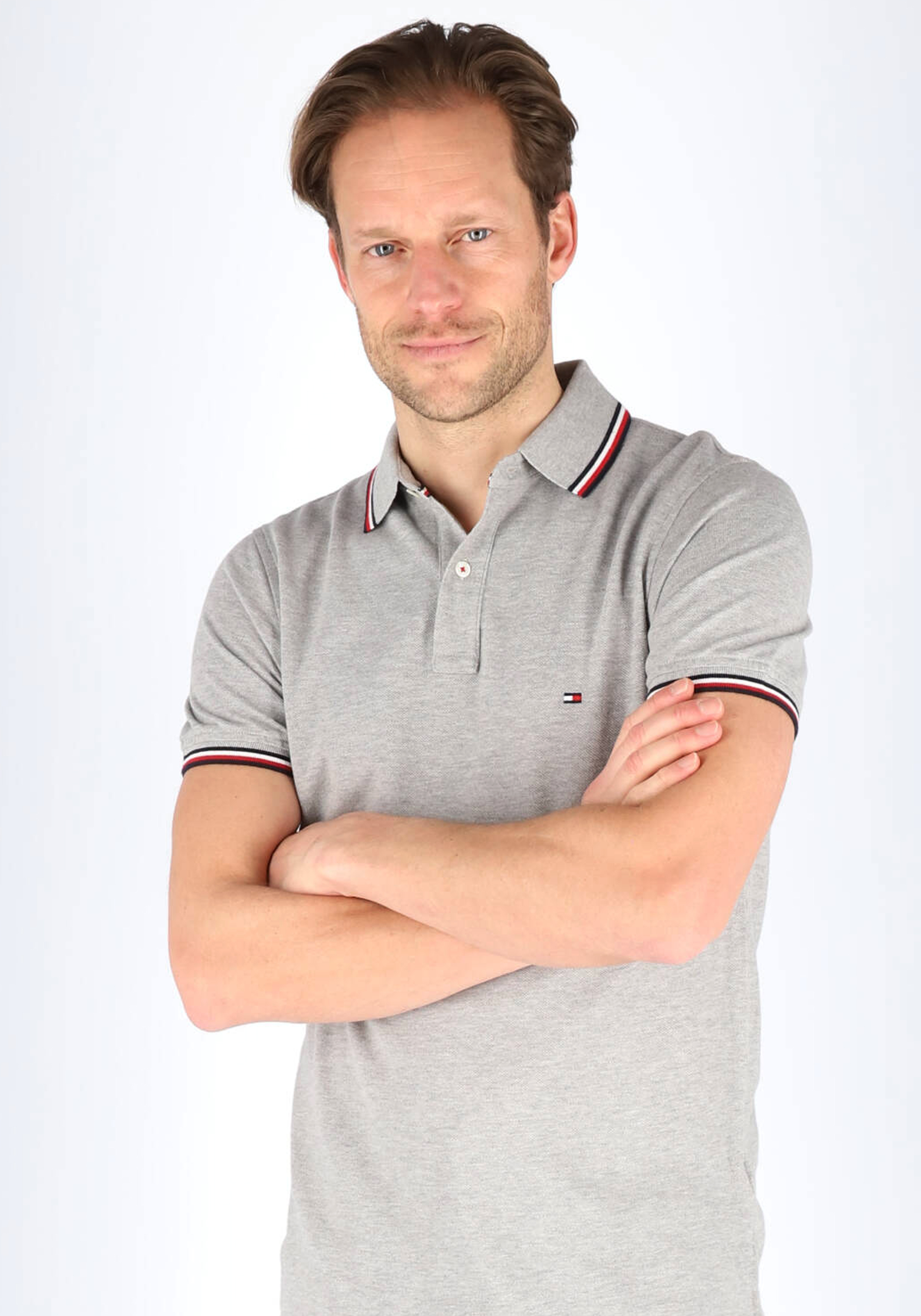 Tommy Hilfiger Core slim fit polo, heren polo met contrastbiezen, grijs melange